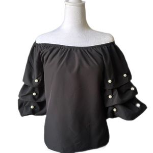 Classic date night top! Can be worn dressy or casual with jeans!